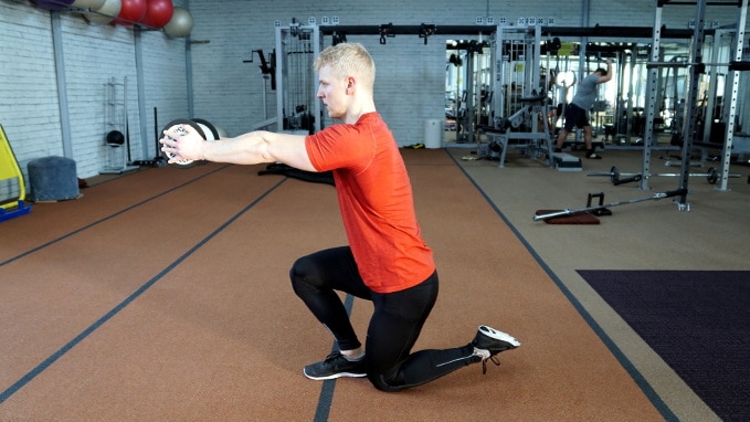 man doing shrimp squat